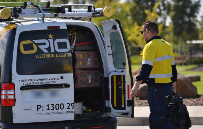 Orion electrician beside the service van